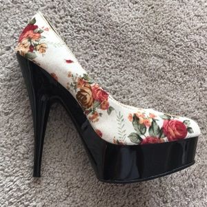 White floral pumps